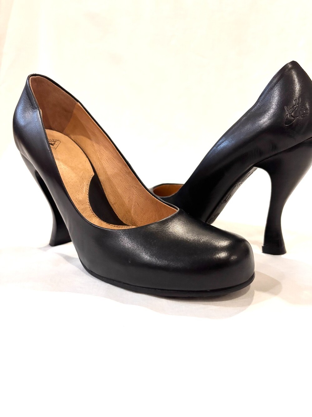 John Fluevog black leather pumps with curved high heel and platform (Size 11)